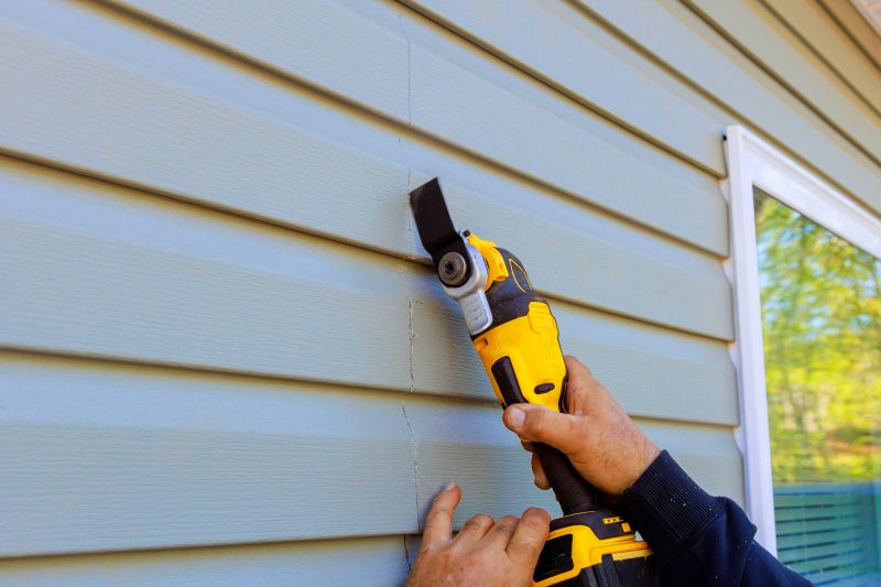 Professional Vinyl Siding Technician
